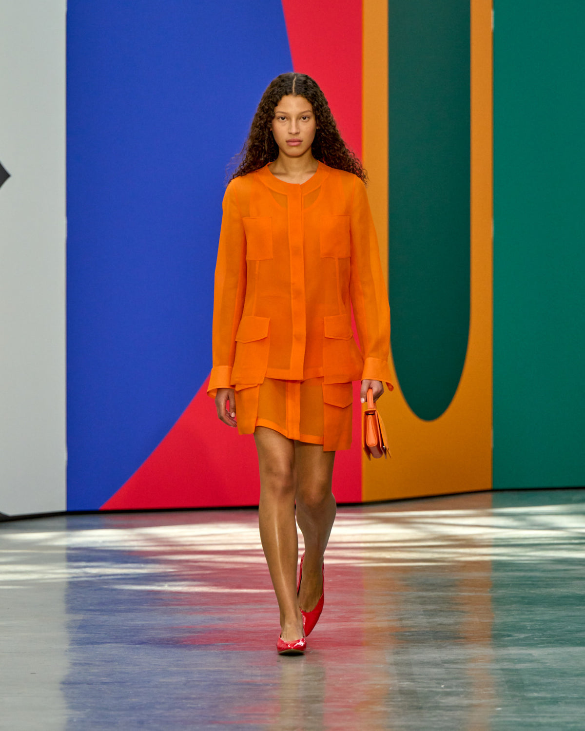 A look from Akris Spring/Summer 2026, blending art and fashion with Swiss luxury design, couture craftsmanship, and timeless elegance inspired by Leon Polk Smith