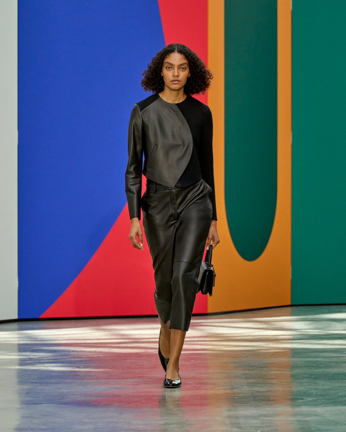 A look from Akris Spring/Summer 2026, blending art and fashion with Swiss luxury design, couture craftsmanship, and timeless elegance inspired by Leon Polk Smith