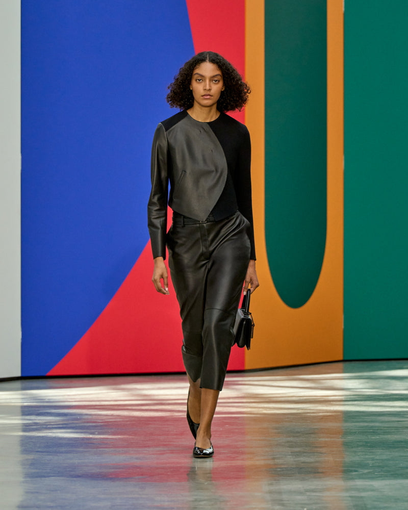 A look from Akris Spring/Summer 2026, blending art and fashion with Swiss luxury design, couture craftsmanship, and timeless elegance inspired by Leon Polk Smith