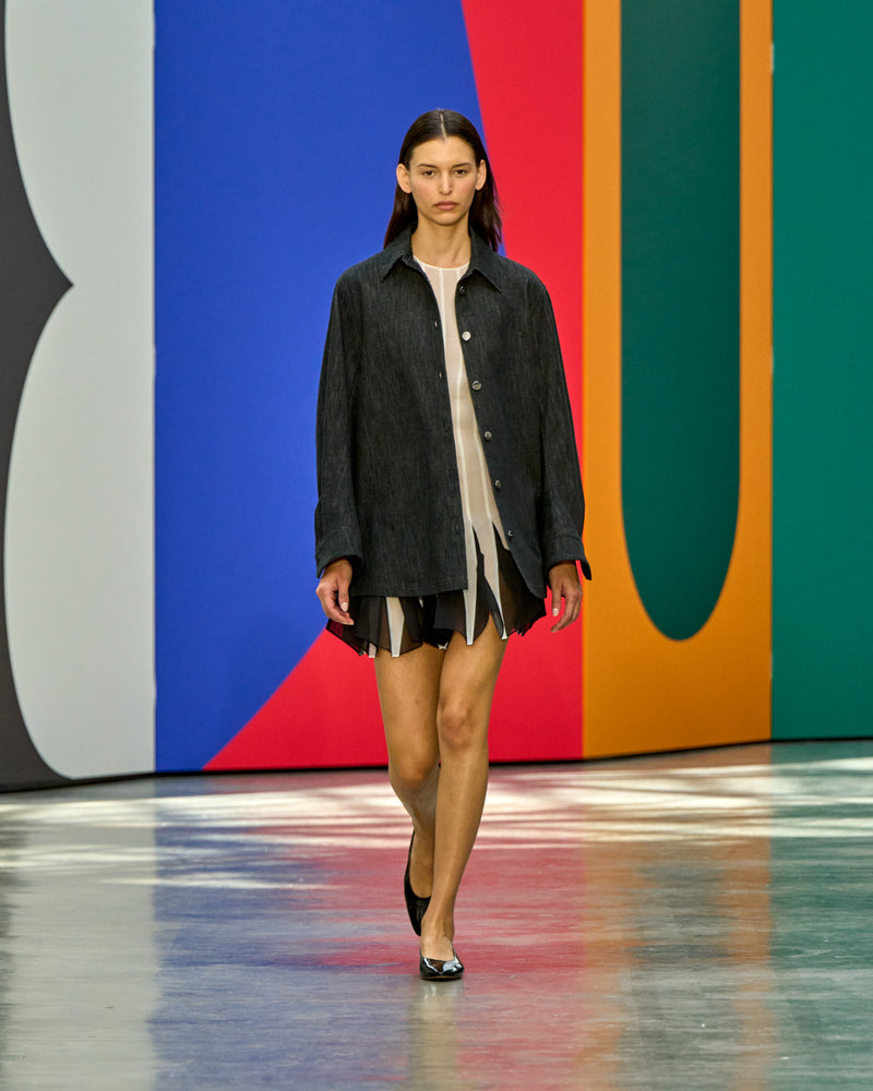 A look from Akris Spring/Summer 2026, blending art and fashion with Swiss luxury design, couture craftsmanship, and timeless elegance inspired by Leon Polk Smith