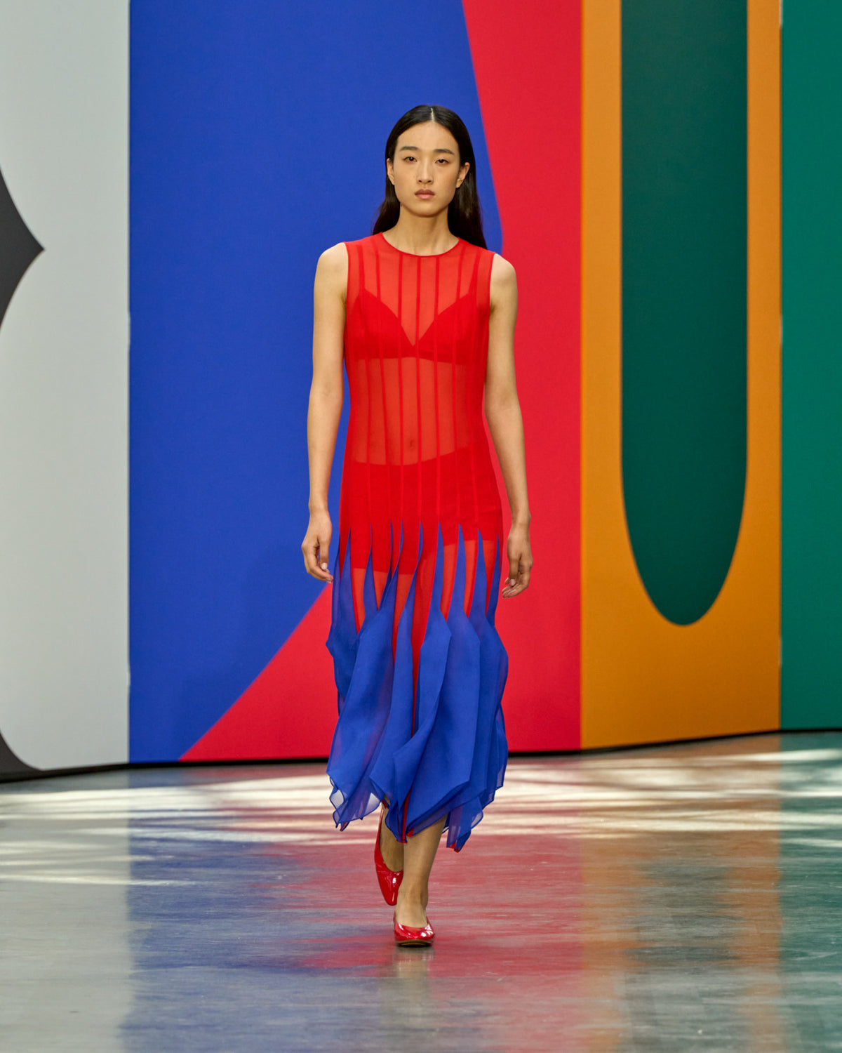 A look from Akris Spring/Summer 2026, blending art and fashion with Swiss luxury design, couture craftsmanship, and timeless elegance inspired by Leon Polk Smith